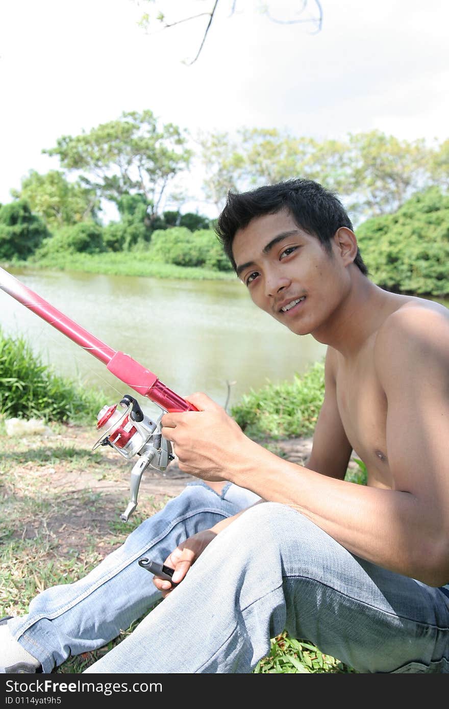 Young man fishing