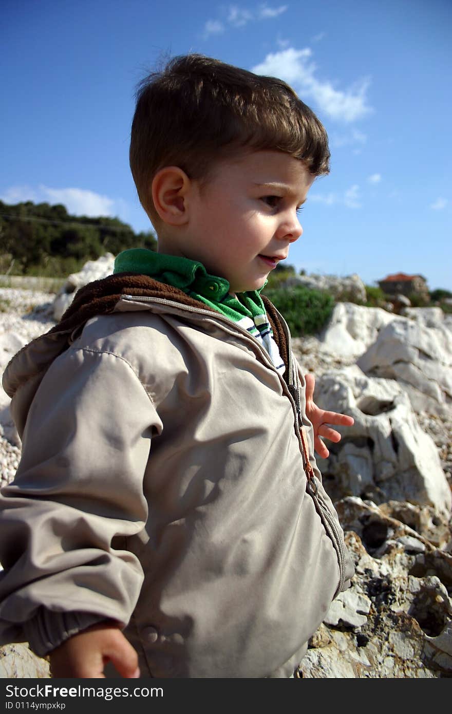 A toddler studying and learning about the world around him. A toddler studying and learning about the world around him.