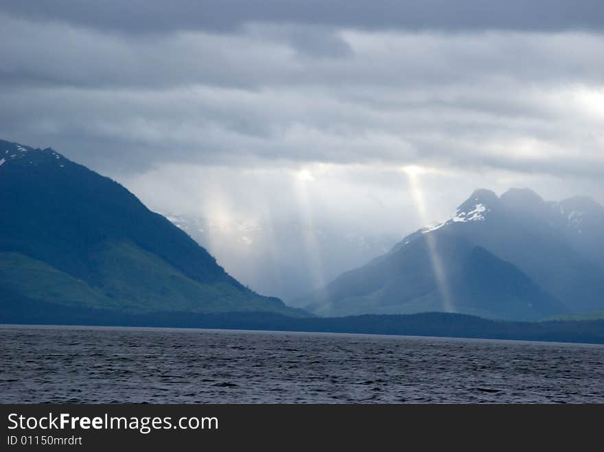 Alaska sun rays from the waters near Tenakee Springs, Alaska  . Alaska sun rays from the waters near Tenakee Springs, Alaska