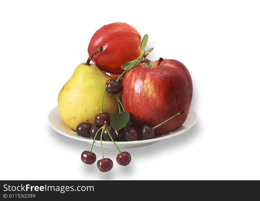 Apple, pear, peach and cherry in a plate on a white background. Apple, pear, peach and cherry in a plate on a white background.