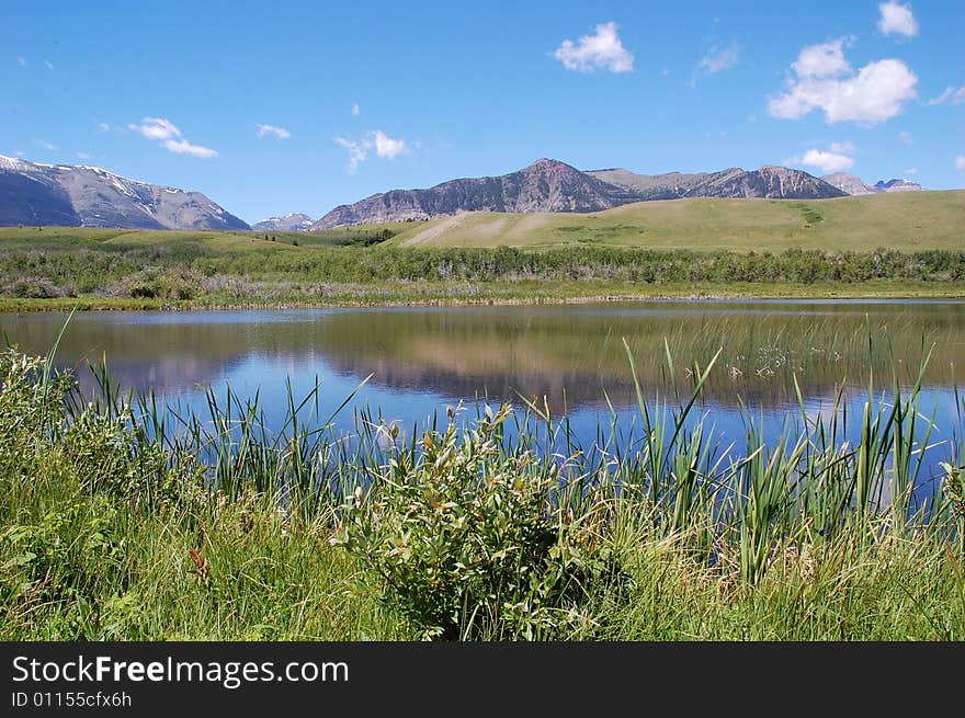 Mountains, Lake And Grassland