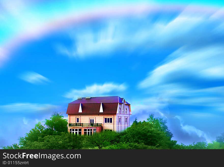 Beautiful green herb and home on background blue sky and cloud