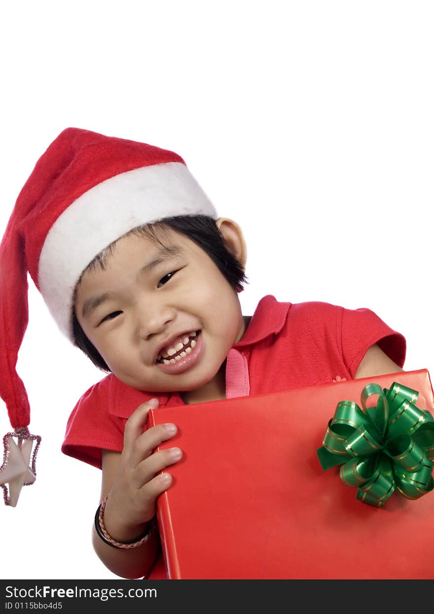 Portrait of a little girl with santa hat and gift. Portrait of a little girl with santa hat and gift