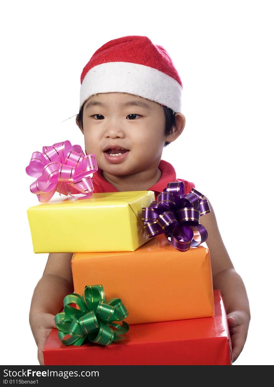 Portrait of a little girl with santa hat and gift. Portrait of a little girl with santa hat and gift