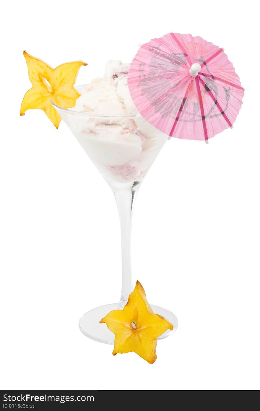 Ice-cream with slice of carambola in a glass on a white background. Ice-cream with slice of carambola in a glass on a white background.