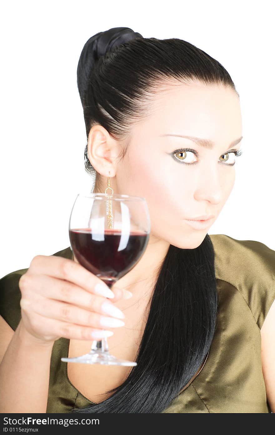 Portrait of a cute brunette holding a glass of red wine on white background. Portrait of a cute brunette holding a glass of red wine on white background