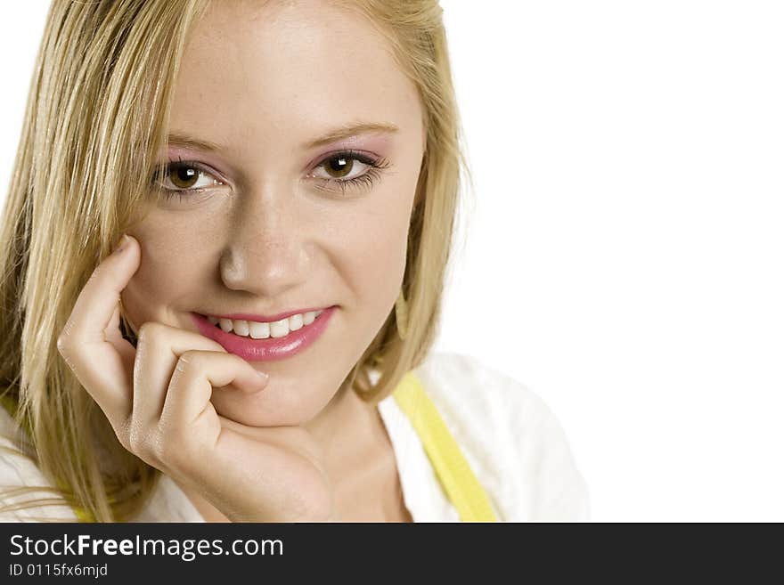 A portrait of a beautiful blond smiling Caucasian young girl (15-24) on white background, model release. A portrait of a beautiful blond smiling Caucasian young girl (15-24) on white background, model release.