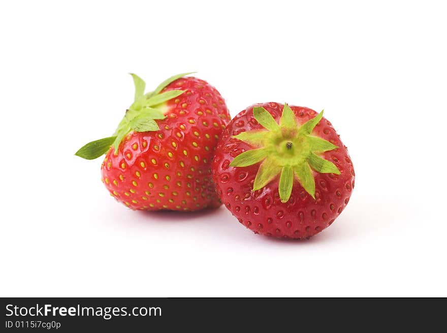 Two healthy and ripe red strawberries