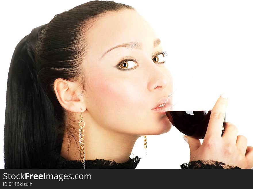 Portrait of a cute brunette holding a glass of red wine on white background. Portrait of a cute brunette holding a glass of red wine on white background