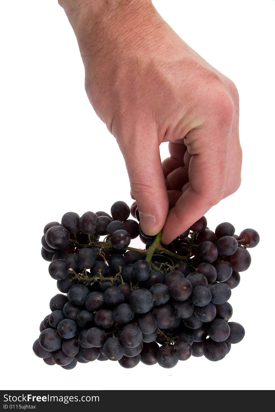 Man`s feast with a grape