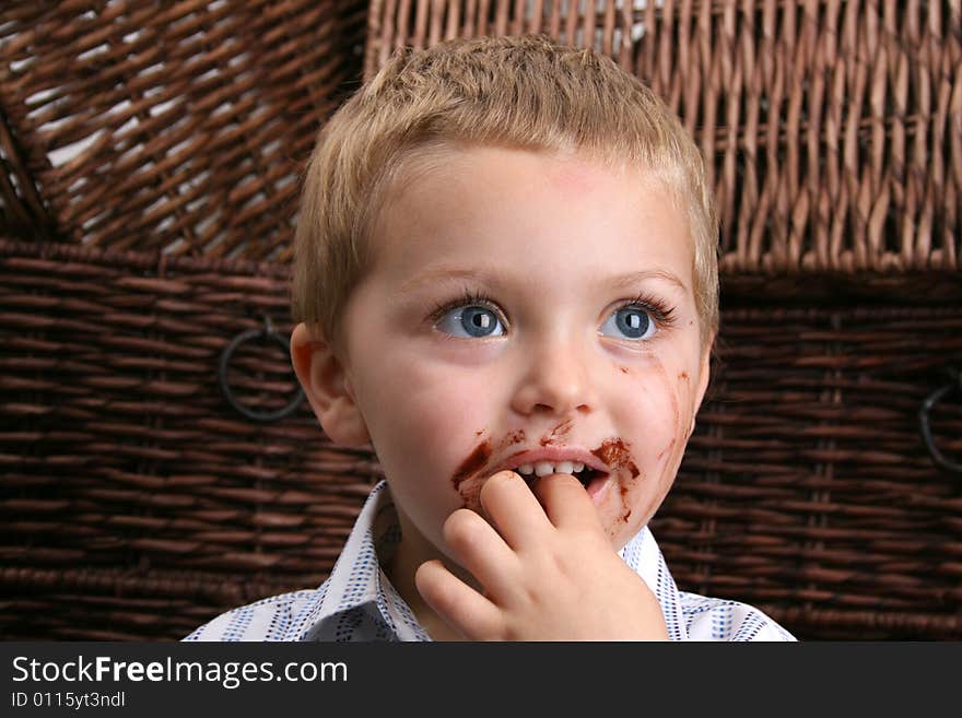 Beautiful blond boy with blue eyes and a dirty mouth