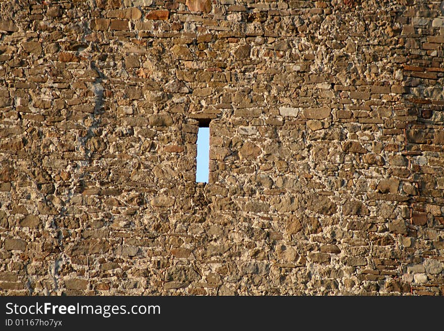 Ancient fortress on the rock on blue sky background. Ancient fortress on the rock on blue sky background