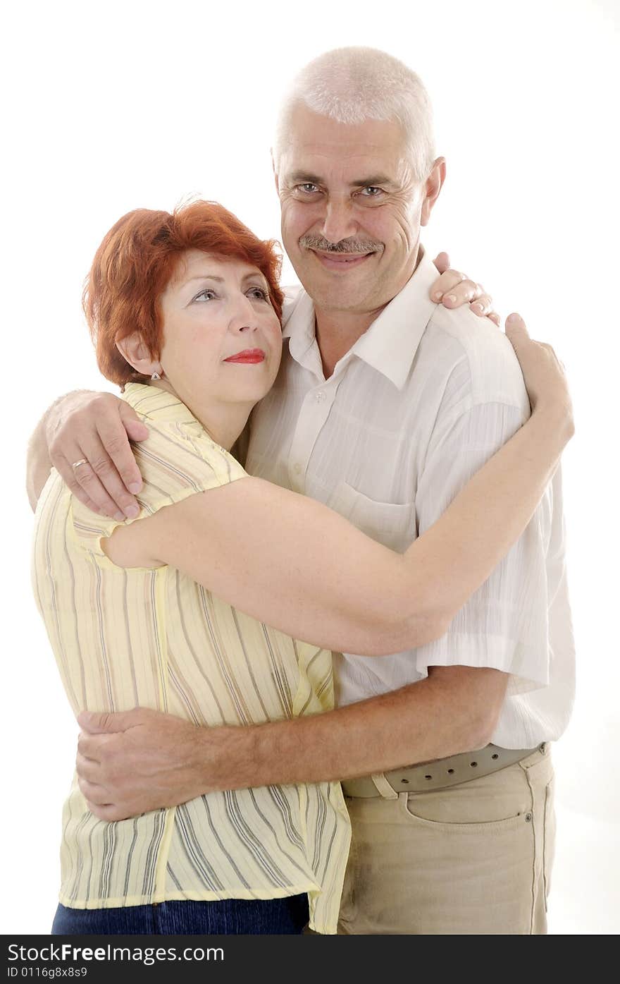 Senior man hugs his wife and she's happy 2. Senior man hugs his wife and she's happy 2