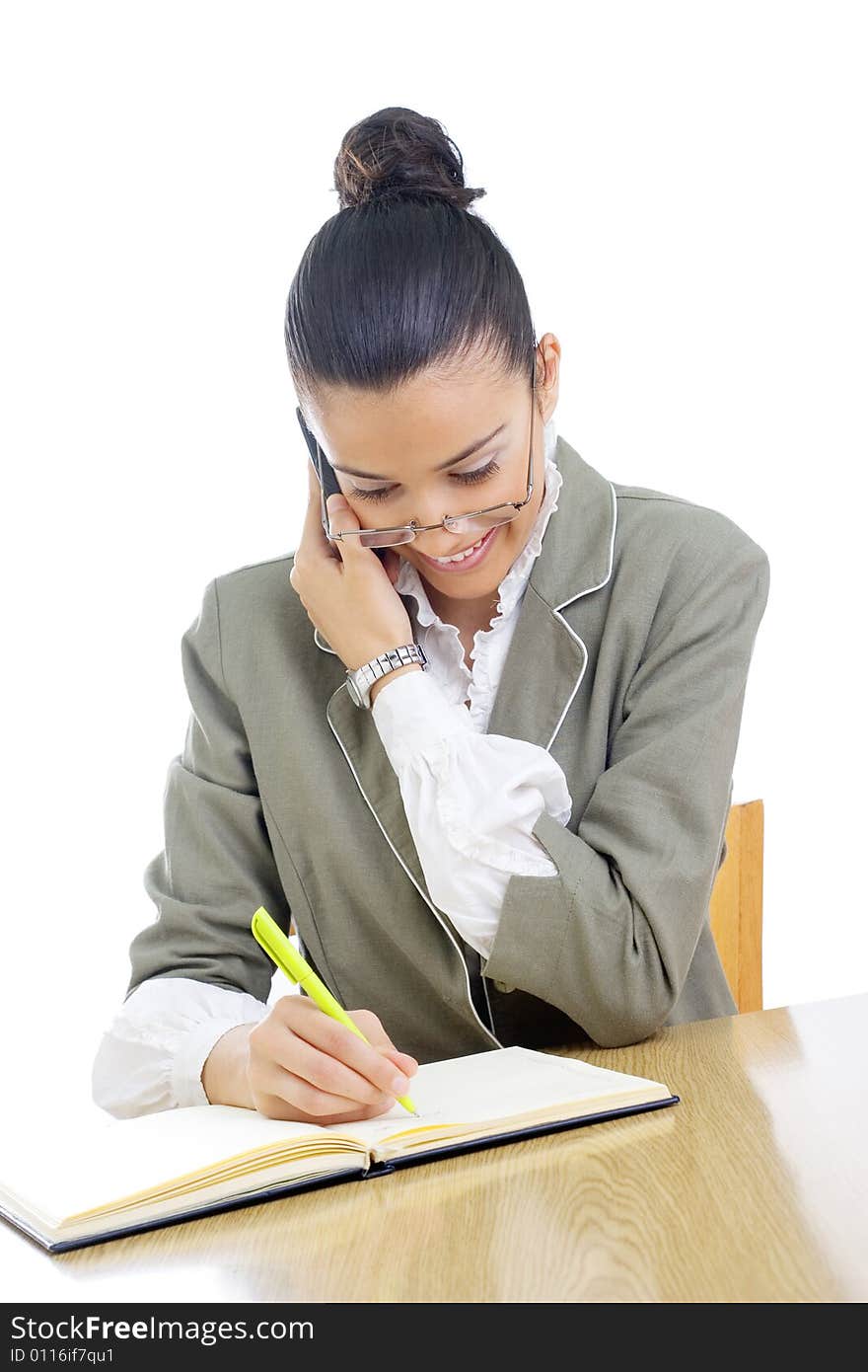 Young businesswoman/teacher working on her desk