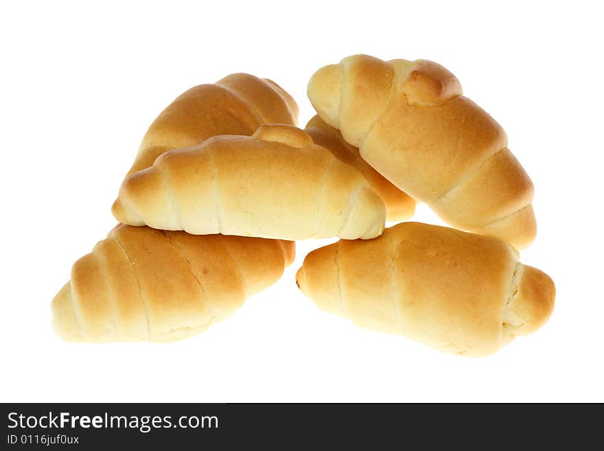 Group of mini croissants isolated on a white background. Group of mini croissants isolated on a white background.