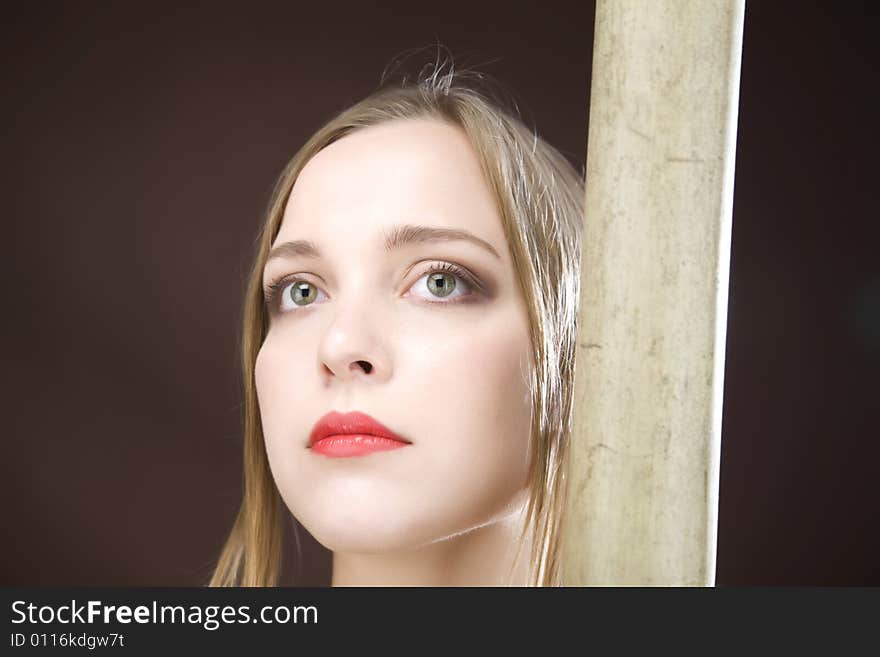 Young Relaxing Glamour Girl With Bamboo Tree. Young Relaxing Glamour Girl With Bamboo Tree