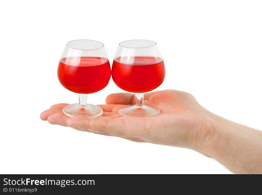 Hand and wineglasses isolated on white background