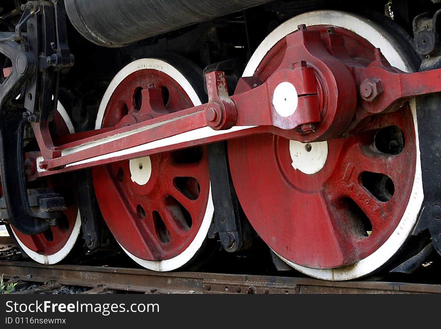 The wheel of an outdated vapour locomotive, it has already had a history of 80 years. The wheel of an outdated vapour locomotive, it has already had a history of 80 years.