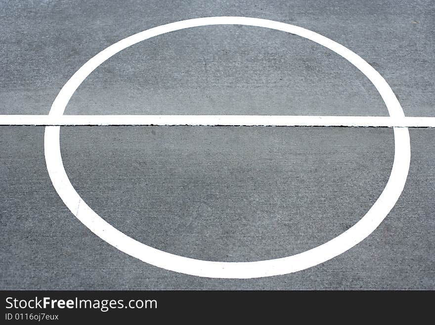 Basketball court lines on a street court