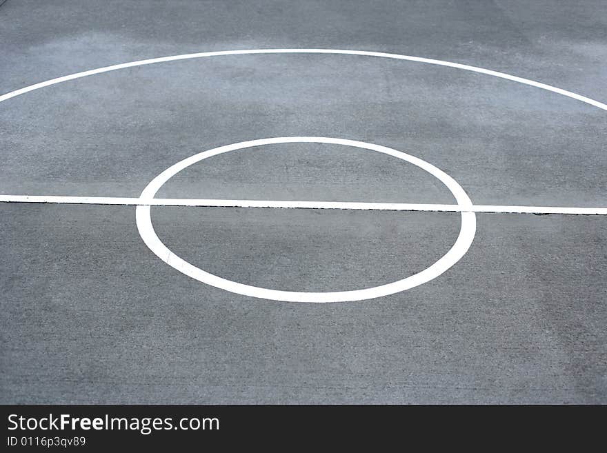 Basketball court lines on a street court