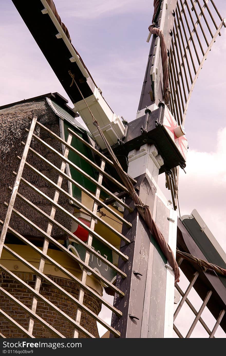 A detail of a water wind mill in the county