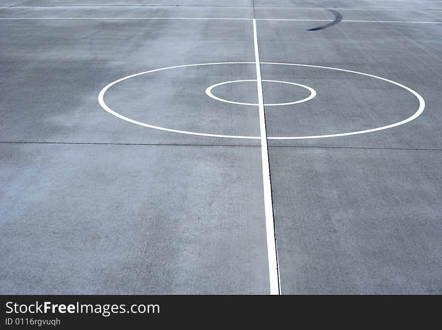 Basketball court lines on a street court