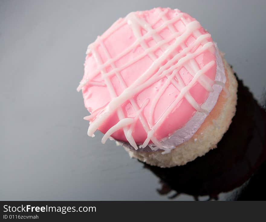 Small cake on black plate