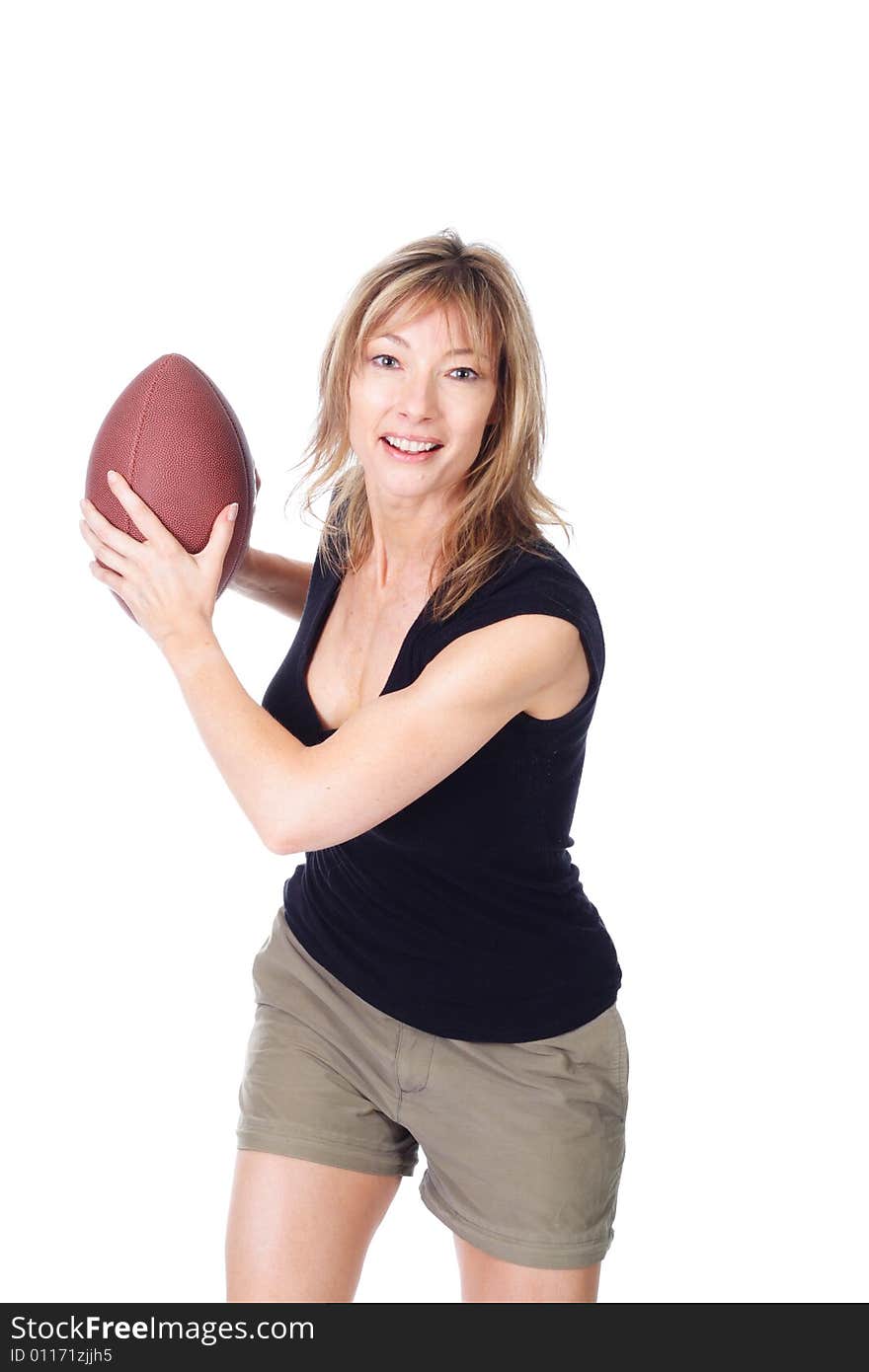 Woman throwing football, isolated on white