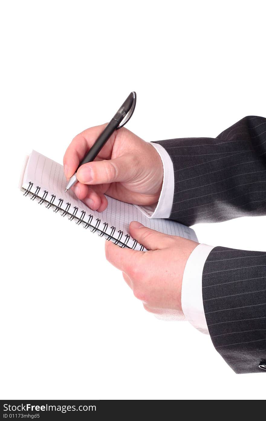 Businessman's hands with pen and spiral notepad close-up isolated