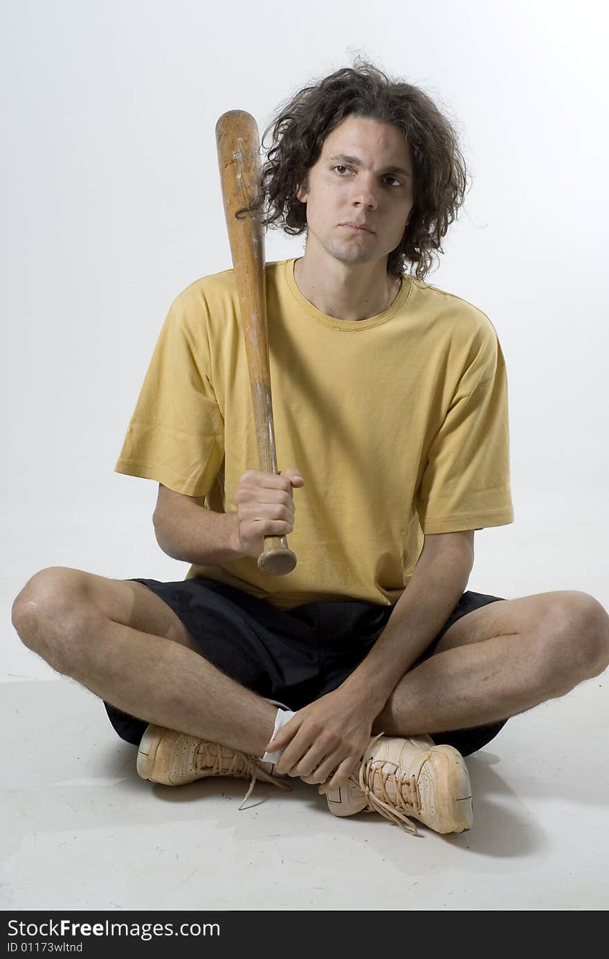 Man Sitting with a Baseball Bat - Vertical