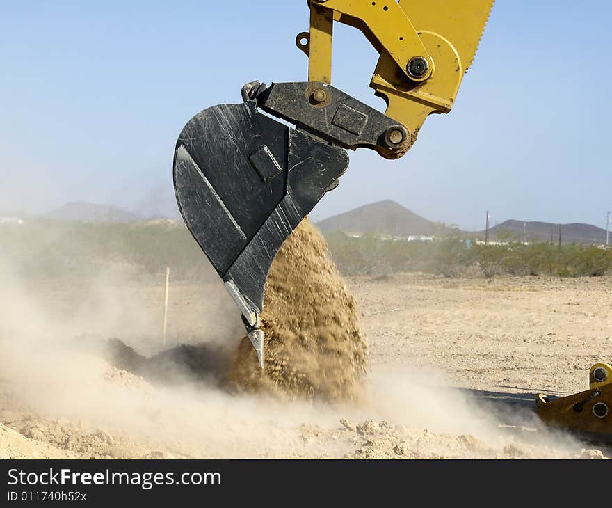 Giant Steam Shovel Releasing Dirt- Horizontal