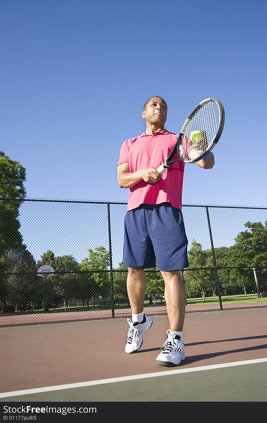 Man On Court Playing Tennis