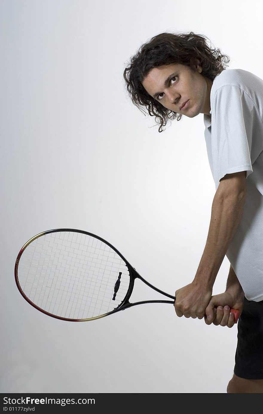 Man Holding Tennis Racket - Vertical