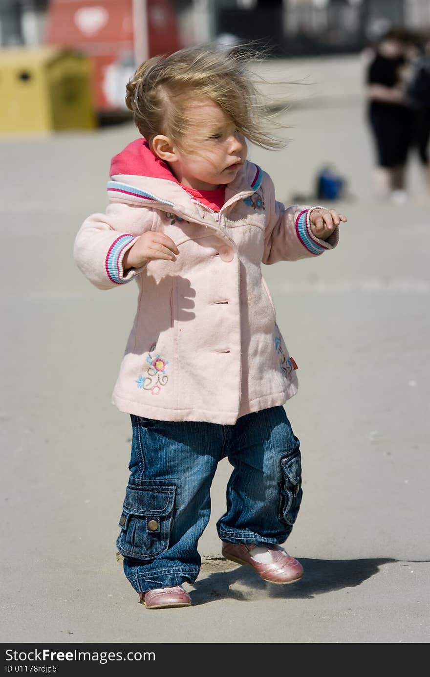 Cute Young Girl On The Beach