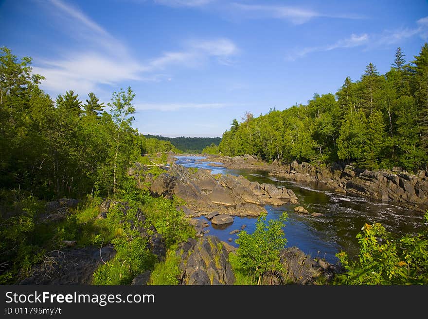 River and stone pas through the North Woods of Minnesota. River and stone pas through the North Woods of Minnesota.