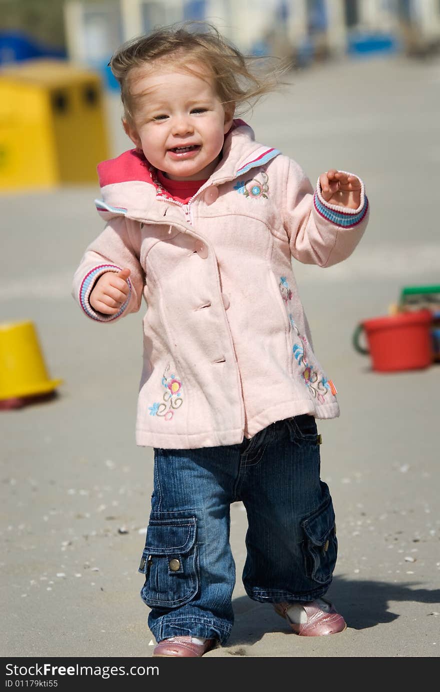 Cute young girl having fun on the beach. Cute young girl having fun on the beach