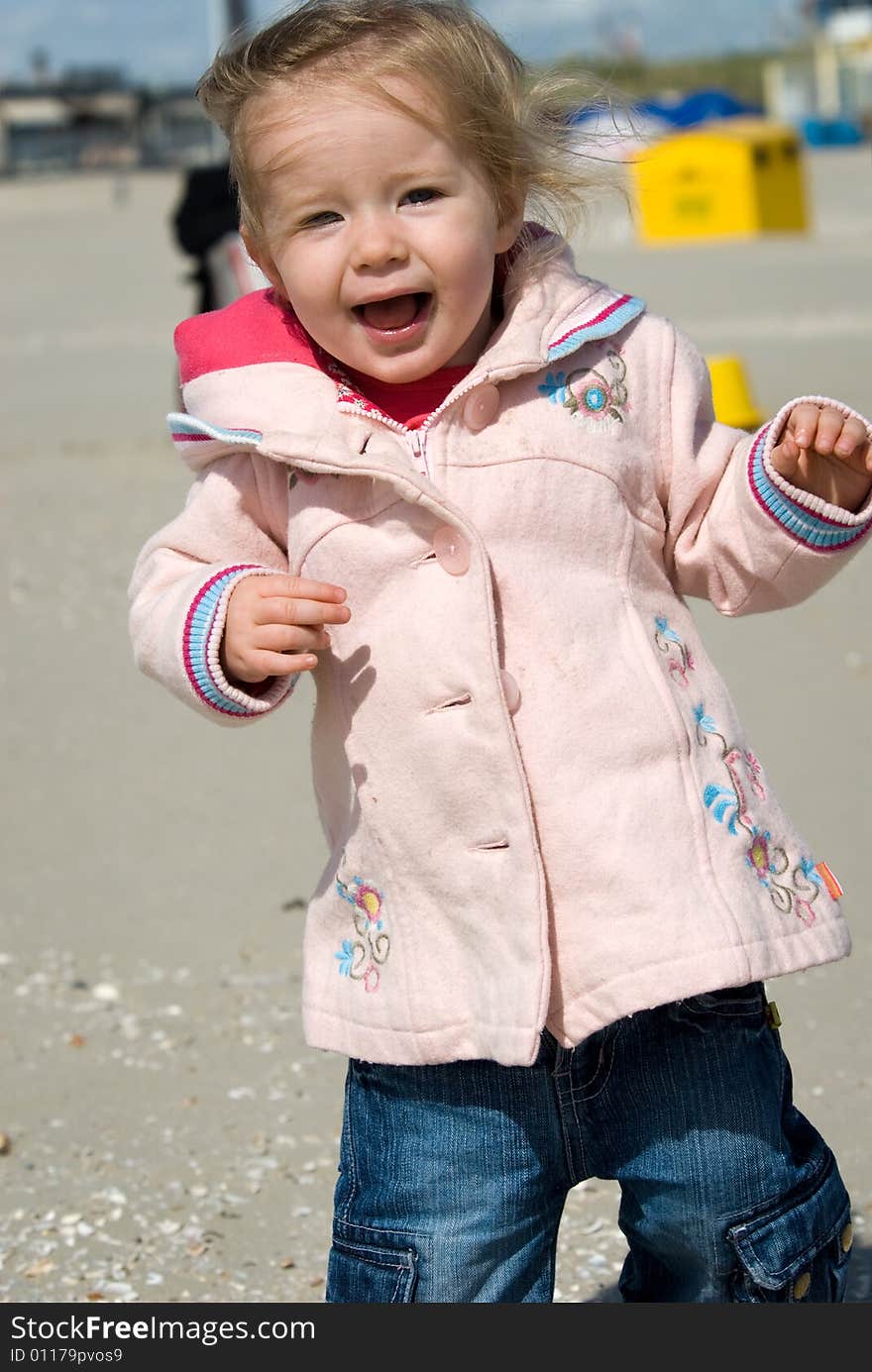 Cute Young Girl On The Beach