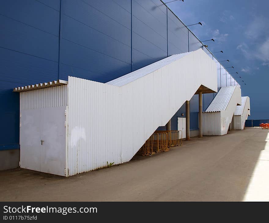 Large shopping center on a background of the dark blue sky