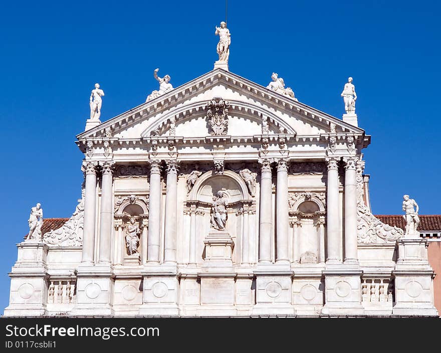 Facade of age-old house ashore venetian channel