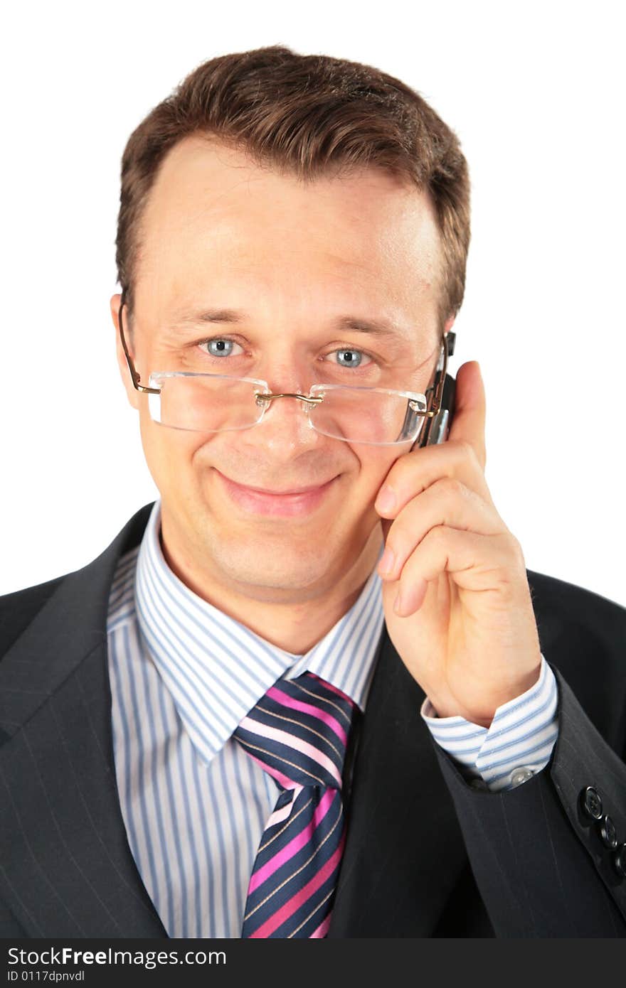 Businessman in glasses speaks on cell phone