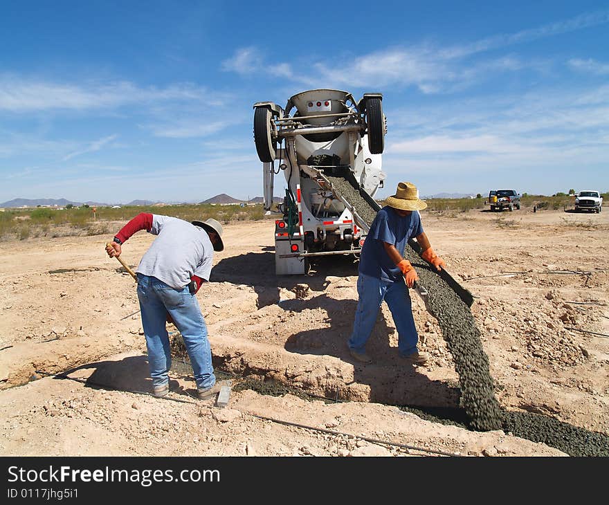 Cement Truck Pouring Cement into Hole - Horizontal