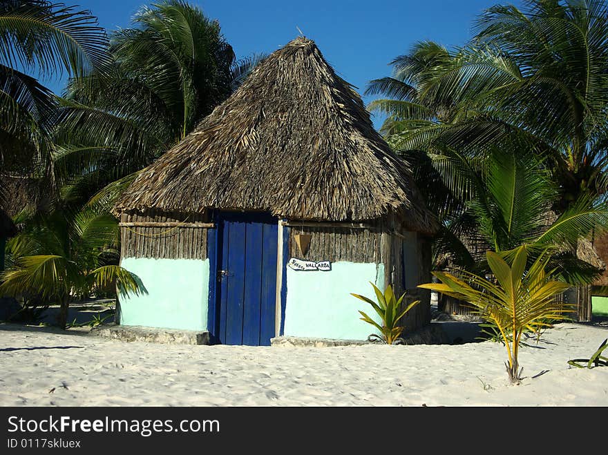 Kayaks and cabanas in  tropical paradise Tulum Mexico. Kayaks and cabanas in  tropical paradise Tulum Mexico