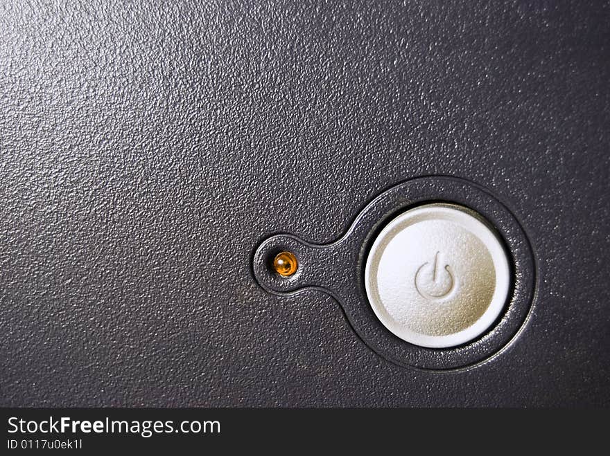 Close-up of power button of PC