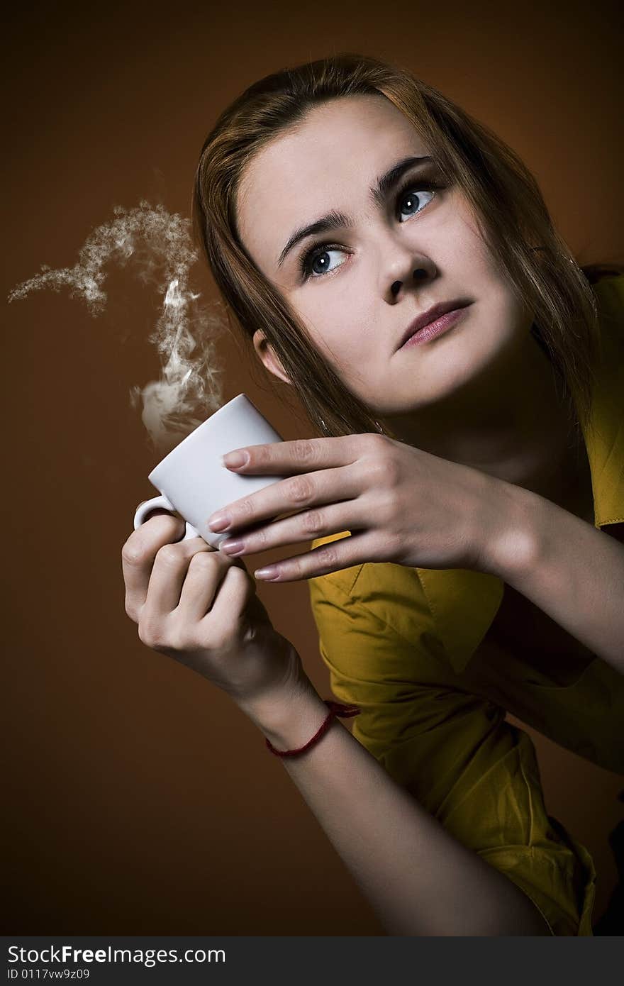 Redhead woman with hot coffee cup