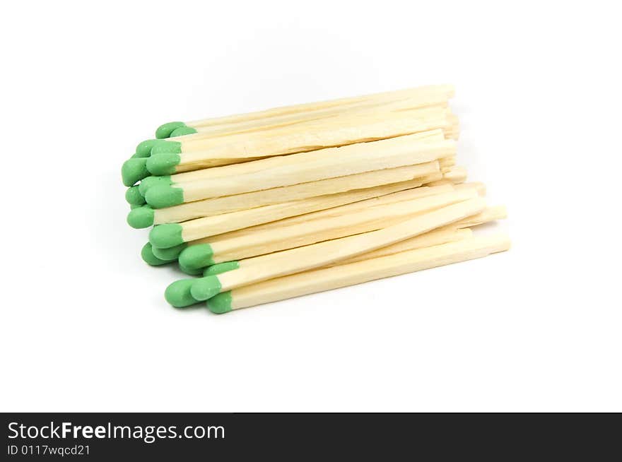 Green wooden matches isolated on white background