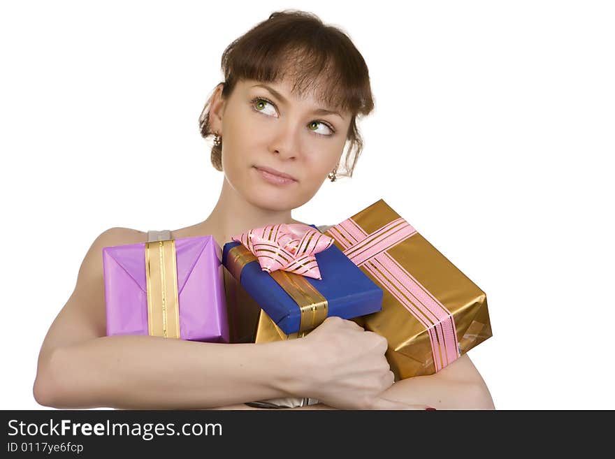 A photo of dreaming girl with gifts over white