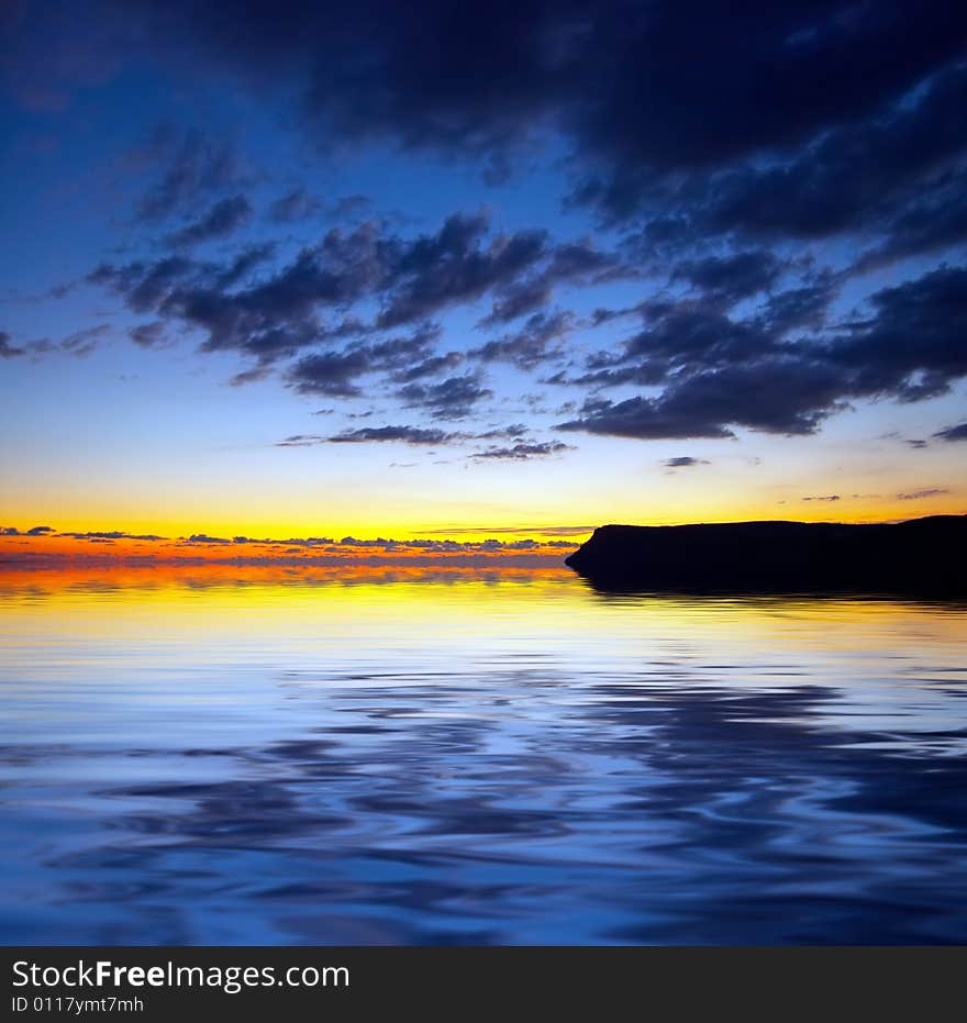 Dark dramatic sky over water