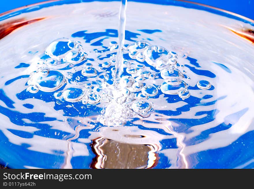 Blue water drops splash background