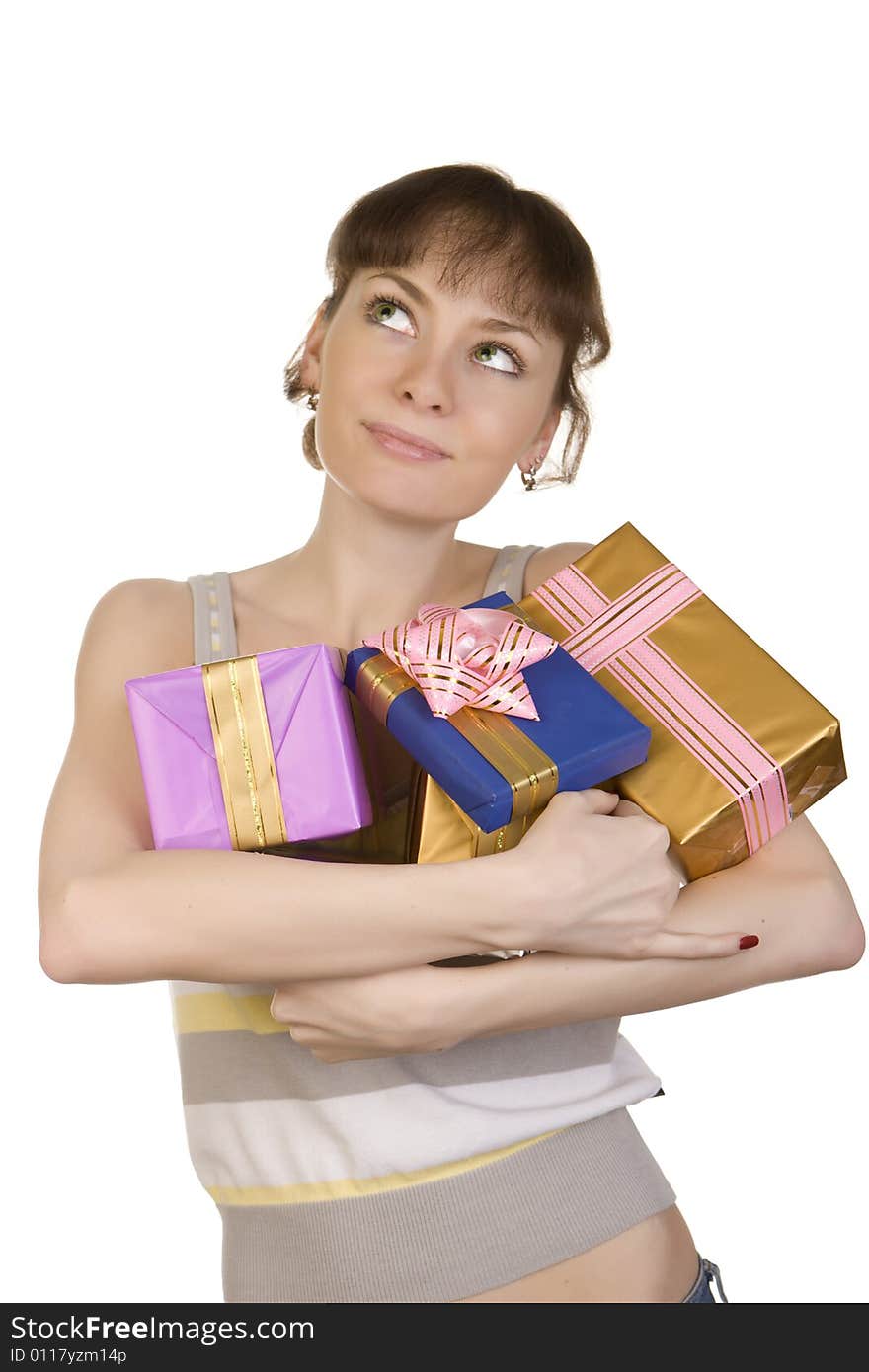 A photo of dreaming girl with gifts over white