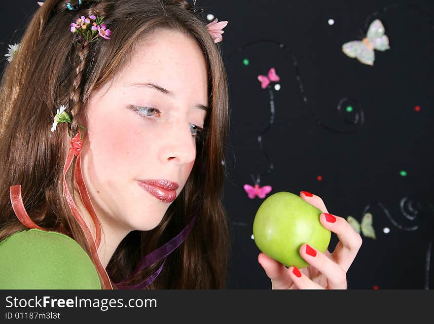 Teenage model with flowers and butterflies in her hair. Teenage model with flowers and butterflies in her hair